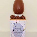 Milk chocolate easter egg with Jurassic salted caramel bon bons