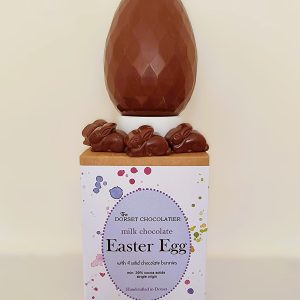 Milk chocolate easter egg with Jurassic salted caramel bon bons
